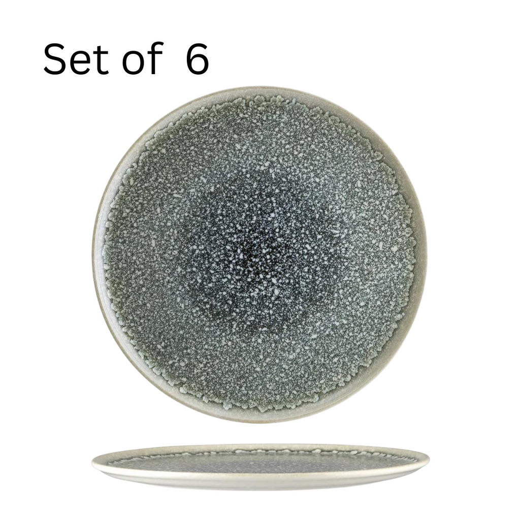 Bonna THAR BLACK ROUND FLAT PLATTER, a spacious 320x25mm round platter with a dark base and a slightly lighter mottled rim, ideal for serving appetizers, desserts, or main courses in a stylish and durable way.