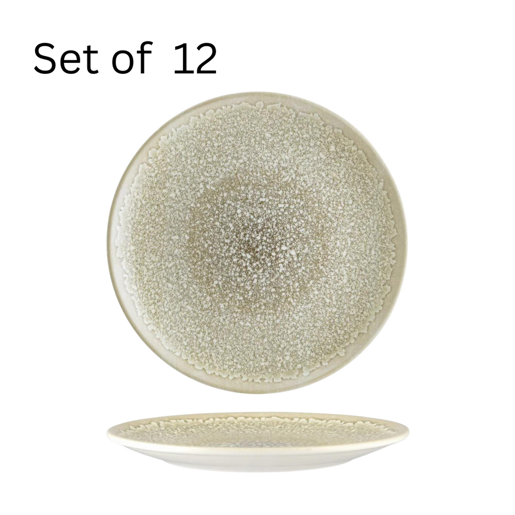 Bonna THAR BLOOM ROUND COUPE PLATE, a large 270x30mm round plate with a natural, rustic feel and a subtle color. Ideal for serving main courses or larger portions, it adds warmth and charm to any table setting and complements other Bonna tableware for a versatile presentation.